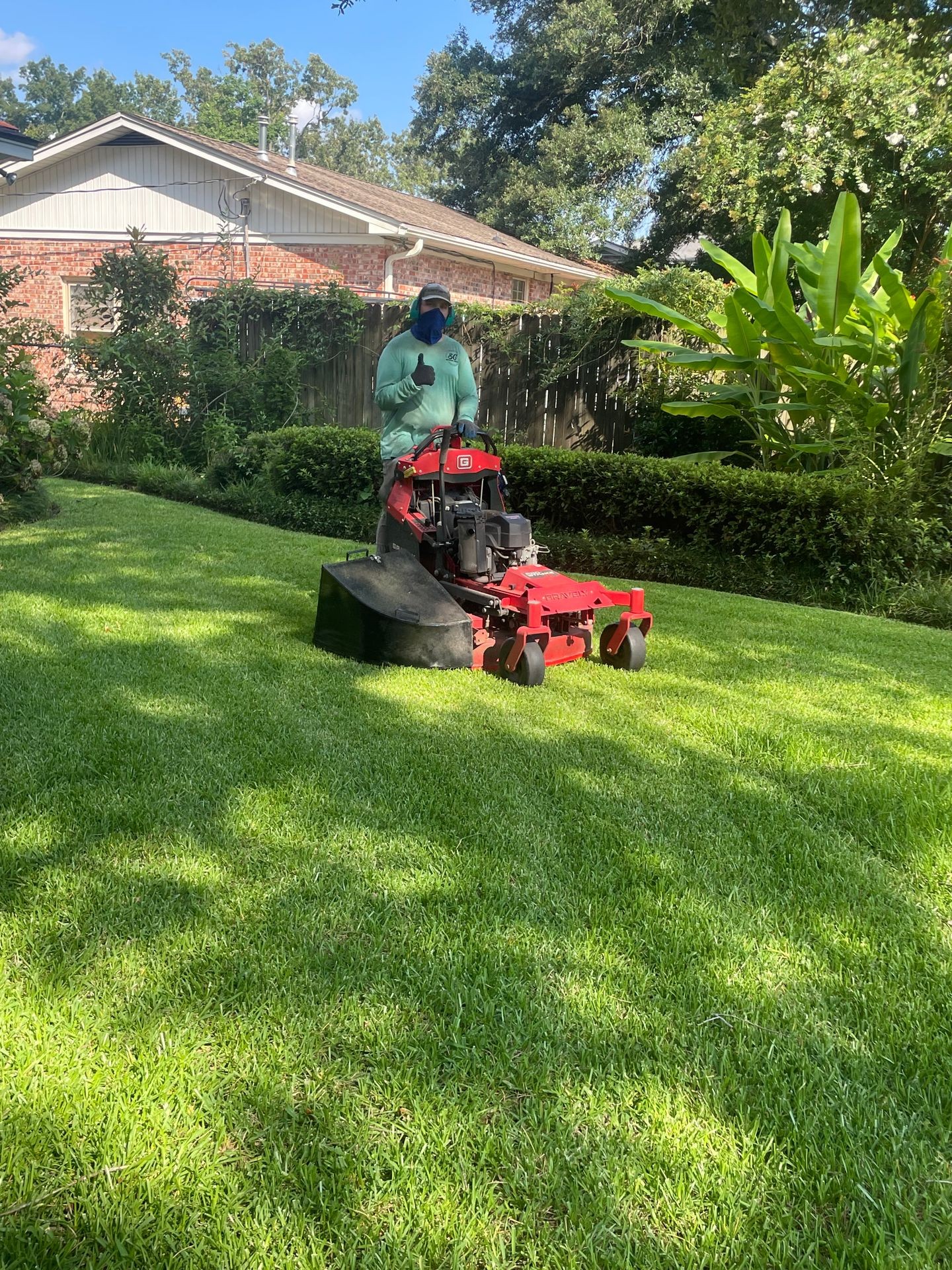 Mowing residential lawn